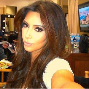 Kim Kardashian Reveals Why She Doesn't Smile in Photos