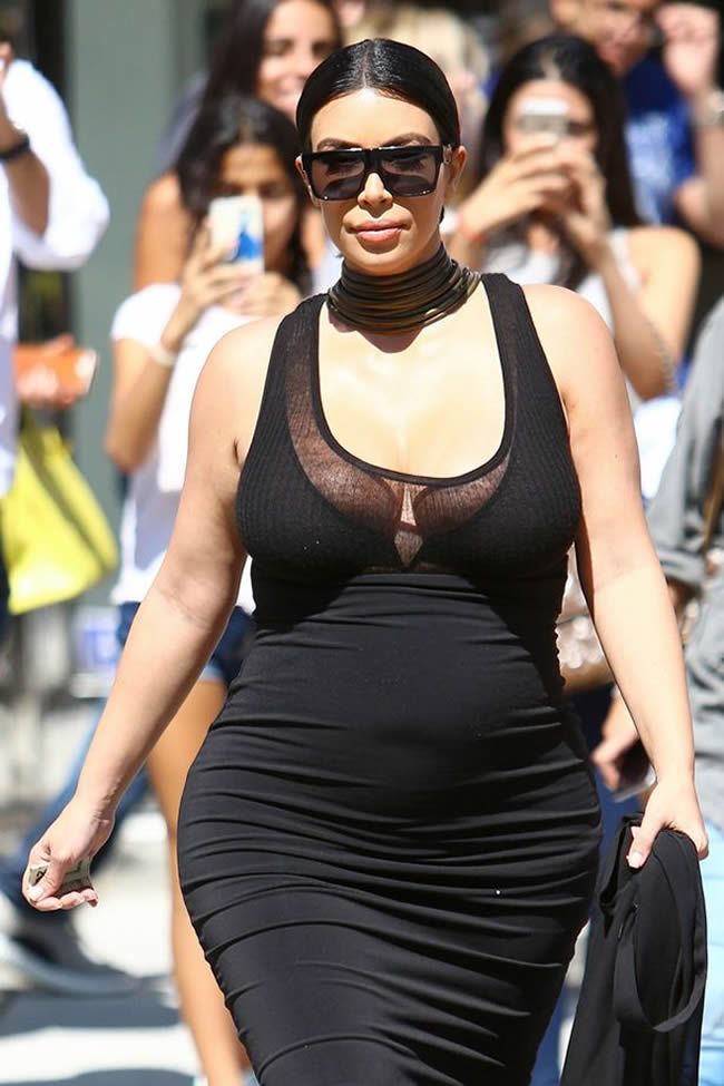 Kim Kardashian in clinging black dress