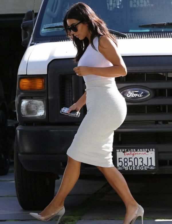 Kim Kardashian in tight whit outfit
