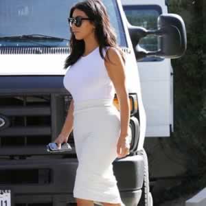 Kim Kardashian looking hot in tight whit outfit
