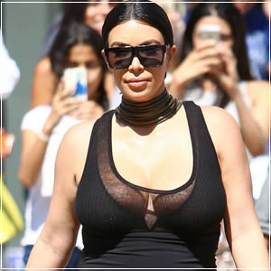 Kim Kardashian in clinging black dress