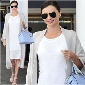 Miranda Kerr step s out in stunning white dress