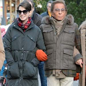 Anne Hathaway Walks Arm in Arm with Designer Valentino in Switzerlan