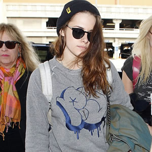 Kristen Stewart displays Natural Beauty and Bed Hair at LAX