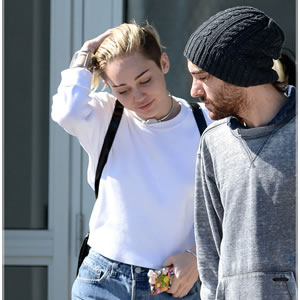 Miley Cyrus Flies to Miami With Kellan Lutz