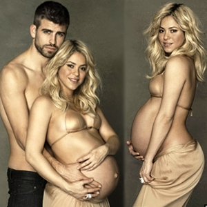 Pregnant Shakira showing off her baby bump wearing a bikini top