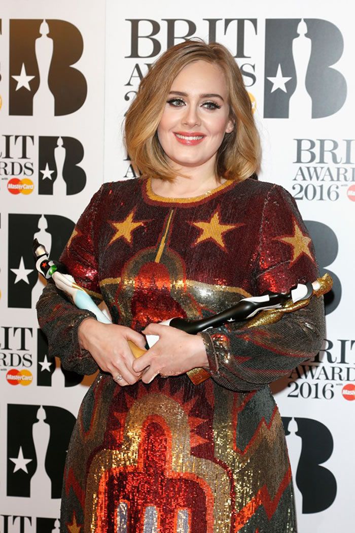 Adele with two of her four Brit Awards