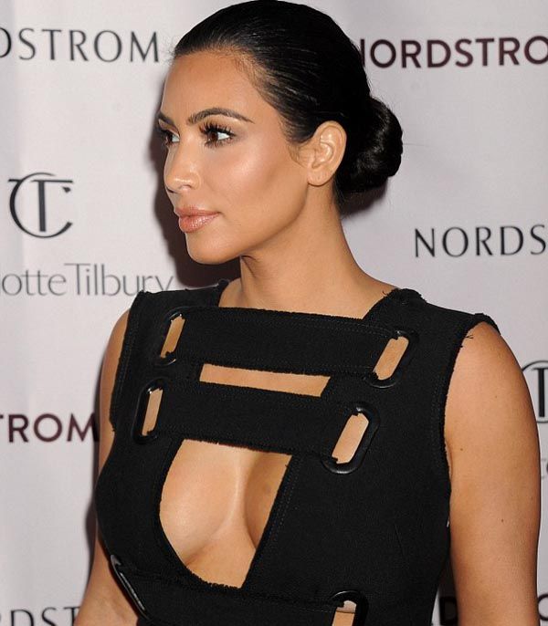 Kim Kardashian in a racy peekaboo midi-dress