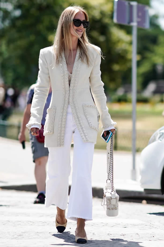 Create a look with varying tones, like off-white and ivory, and keep your blazer buttoned for a more polished effect.