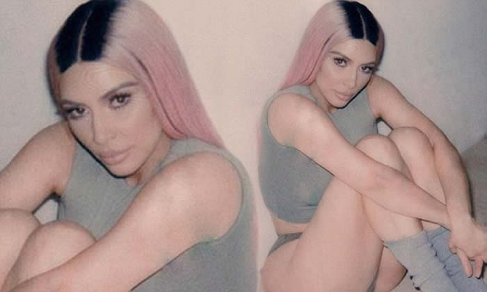 Kim Kardashian Shows Off Her Bountiful Curves in Tank Top And bikini