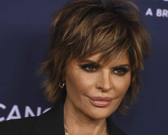 Lisa Rinna Declares is 58” in New Swimsuit